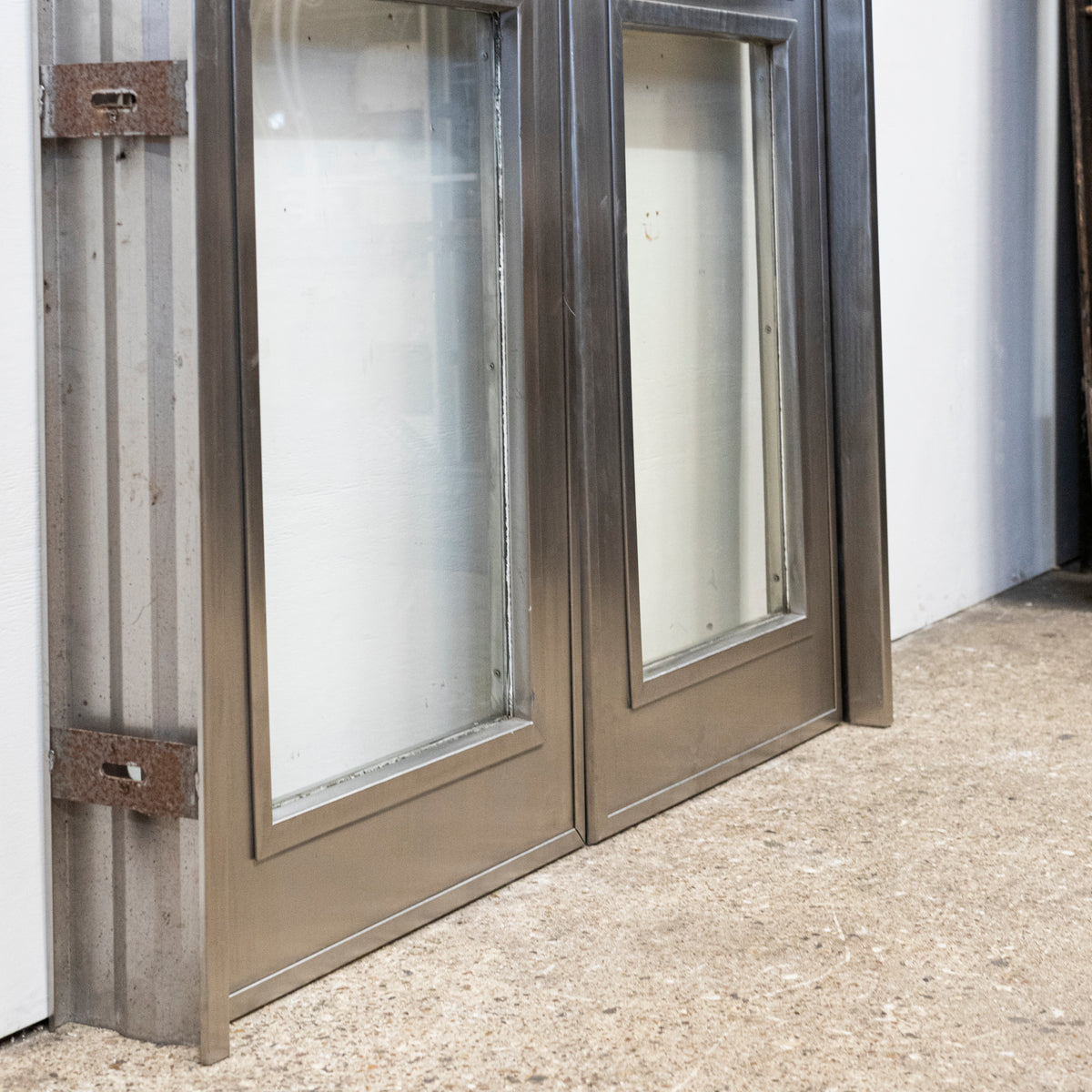Pair Of Reclaimed Mid-Century Chrome Double Doors | The Architectural Forum