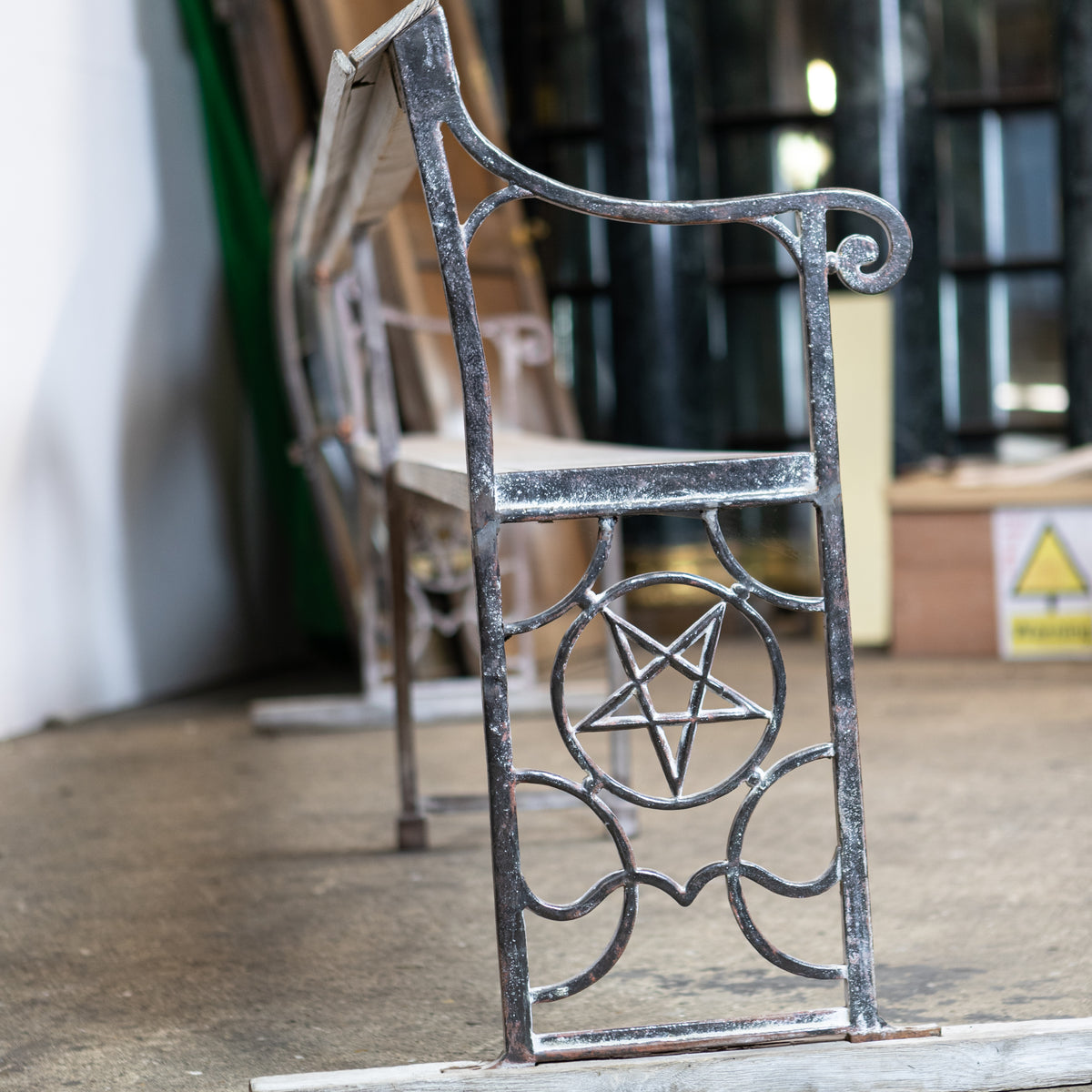 Reclaimed Cast Iron Long Bench with Pentagram | The Architectural Forum