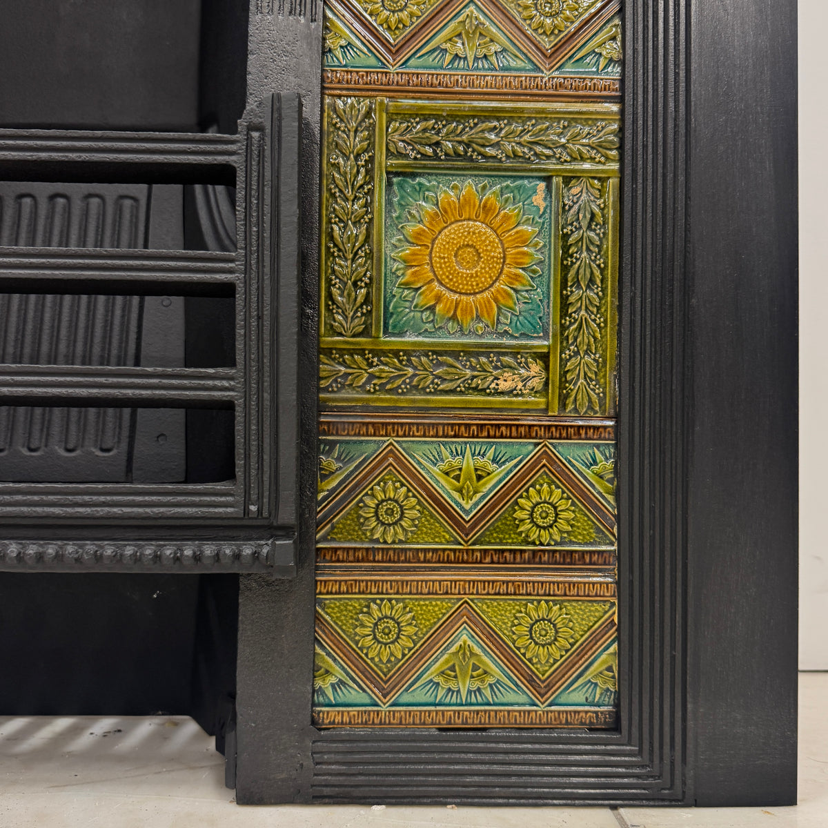 Bishop & Barnards Antique Cast Iron Insert Inspired by Thomas Jeckyll | The Architectural Forum