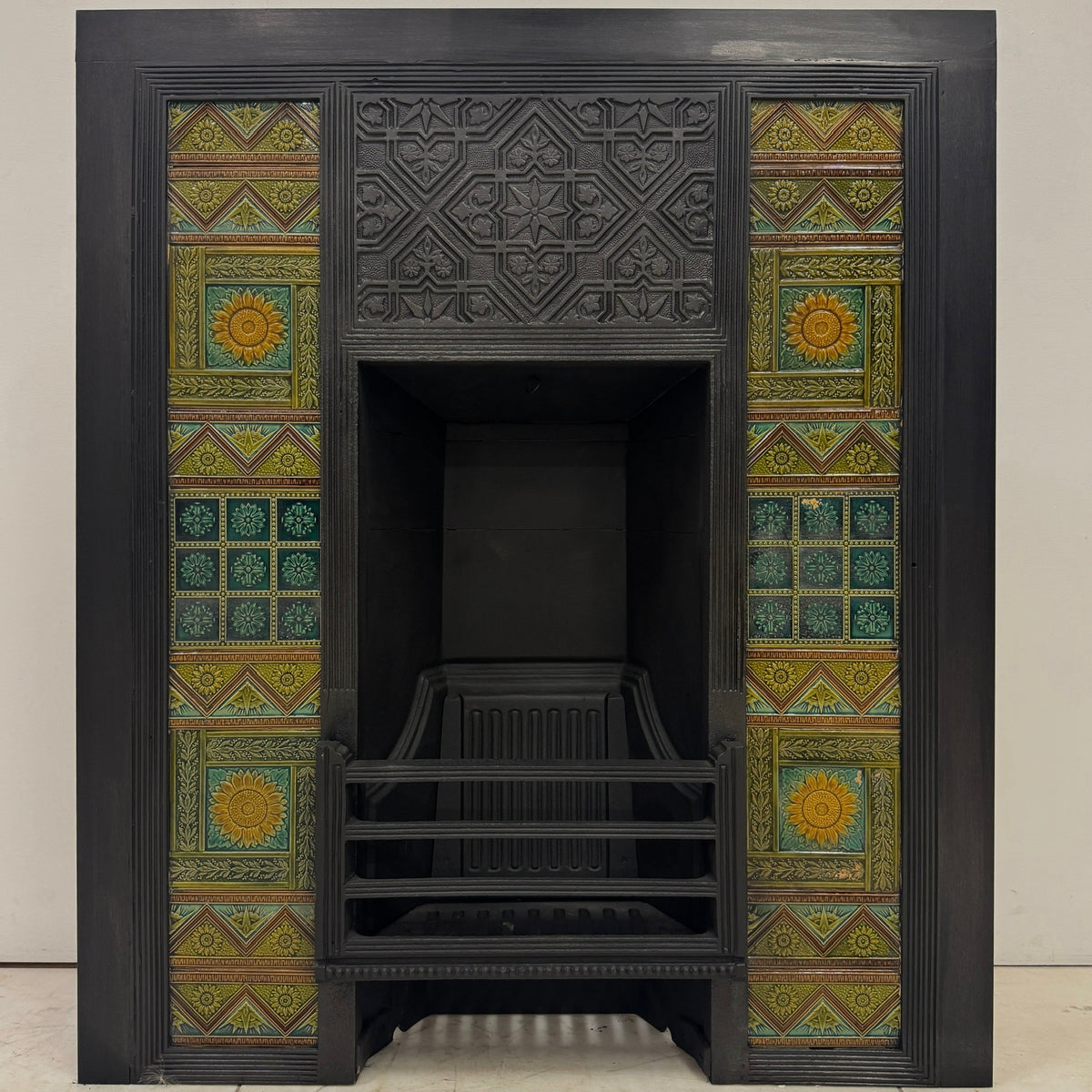 Bishop & Barnards Antique Cast Iron Insert Inspired by Thomas Jeckyll | The Architectural Forum