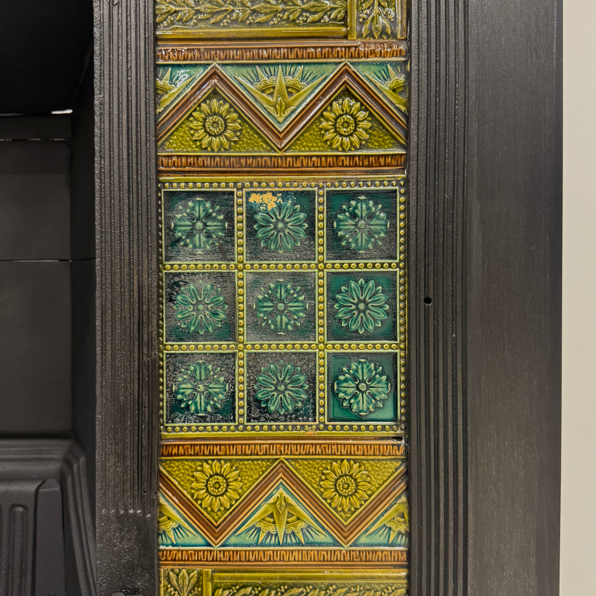 Bishop & Barnards Antique Cast Iron Insert Inspired by Thomas Jeckyll | The Architectural Forum