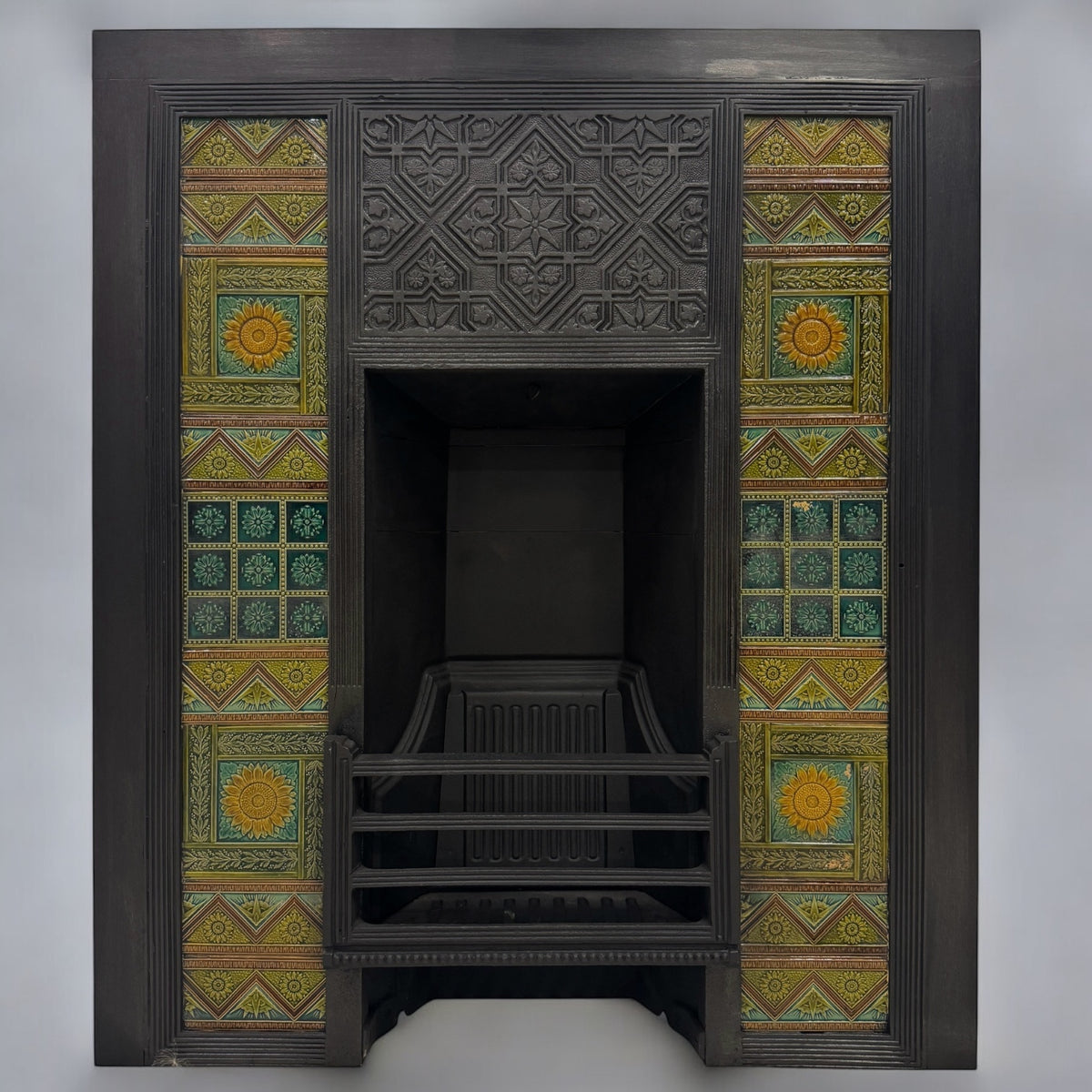 Bishop & Barnards Antique Cast Iron Insert Inspired by Thomas Jeckyll | The Architectural Forum