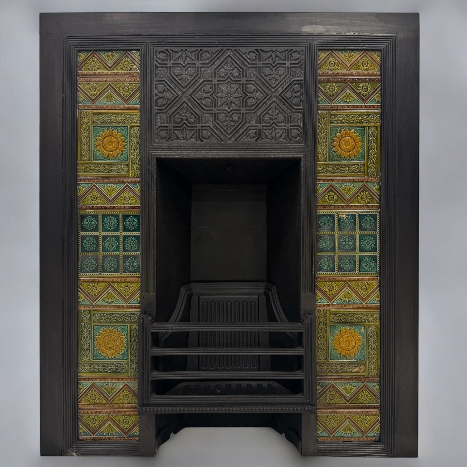 Bishop & Barnards Antique Cast Iron Insert Inspired by Thomas Jeckyll | The Architectural Forum