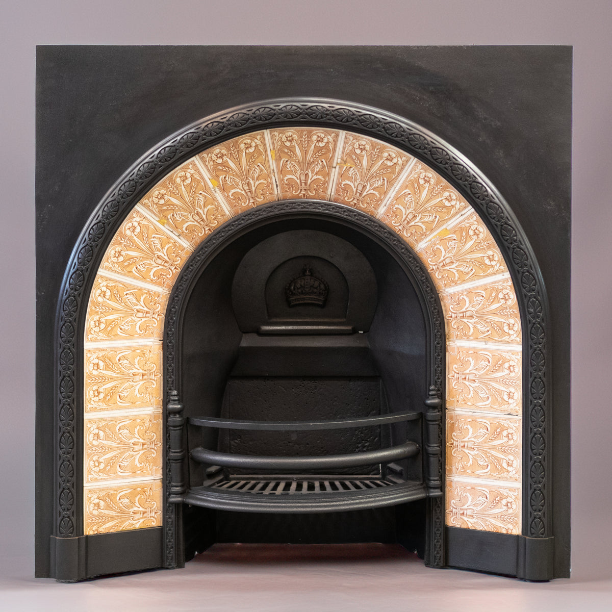 Antique Fireplace Insert with Tiled Arched Opening | Steele & Wood Tiles | The Architectural Forum