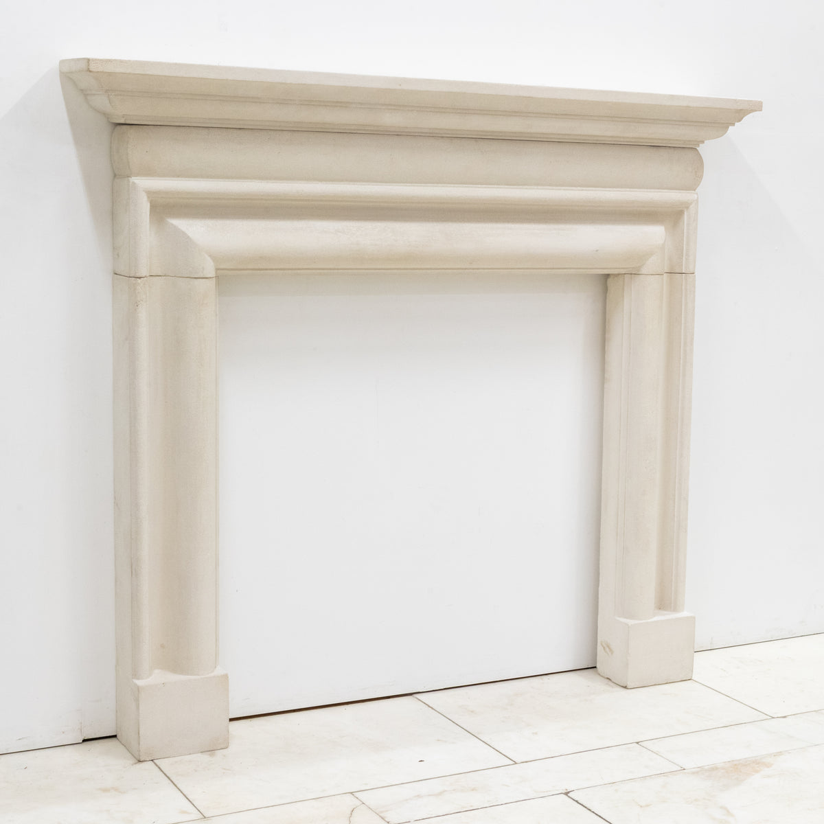 Reclaimed Stone Fireplace Surround | The Architectural Forum