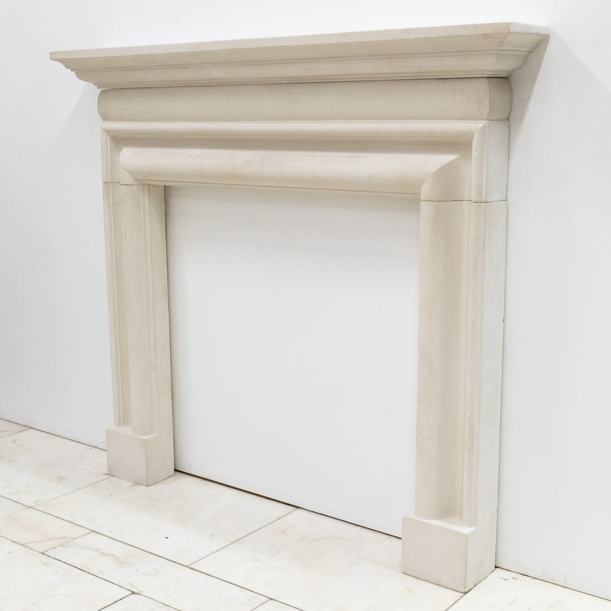 Reclaimed Stone Fireplace Surround | The Architectural Forum