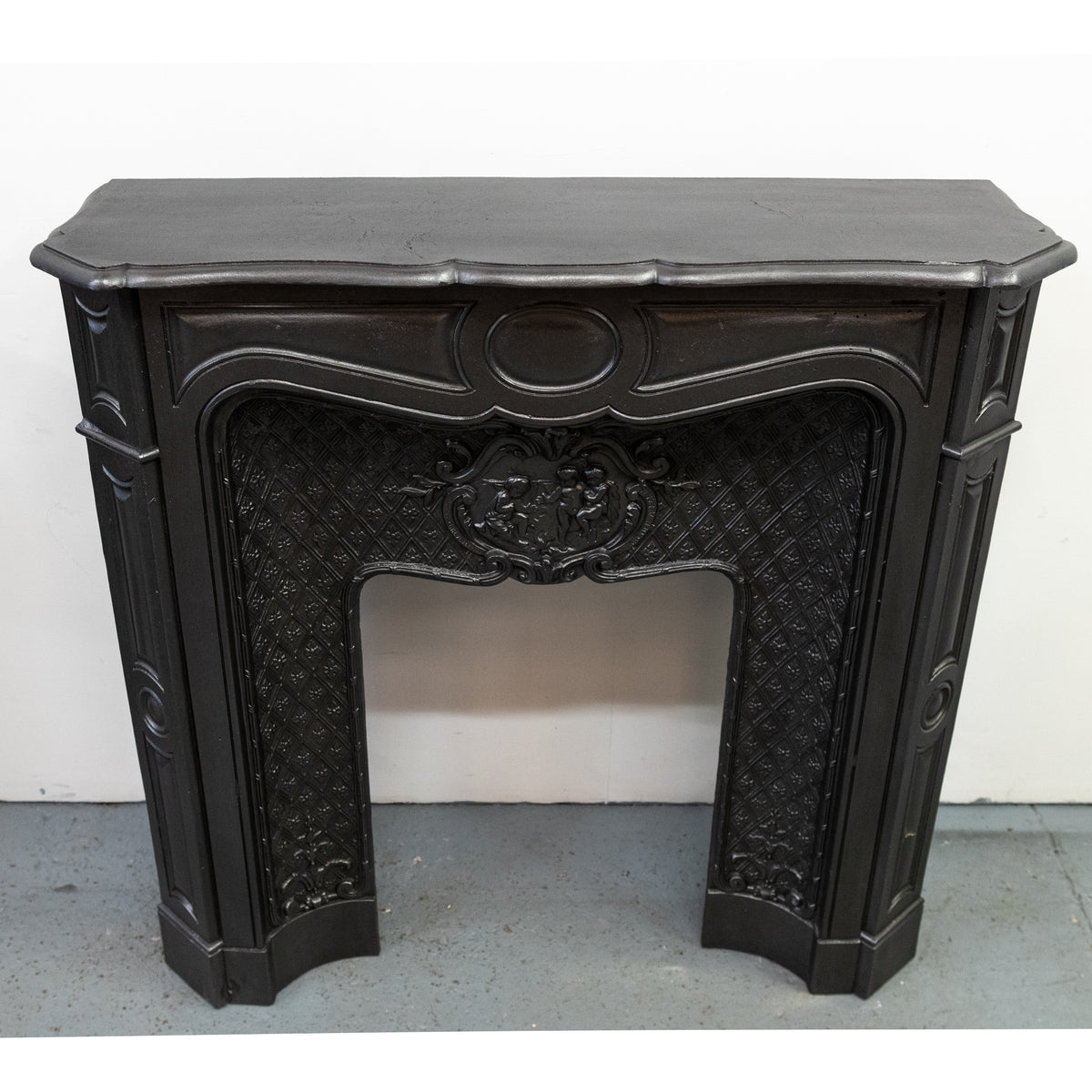 Rare Highly Ornate Antique Cast Iron Fireplace Surround | Pair Available
