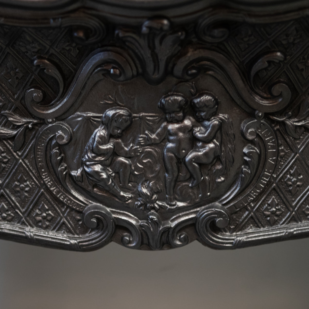 Rare Highly Ornate Antique Cast Iron Fireplace Surround | Pair Available