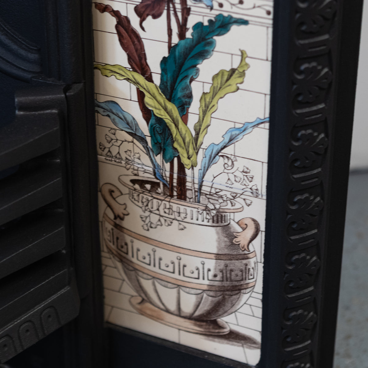 Antique Victorian Cast Iron Fireplace with Decorative Floral Tiles | The Architectural Forum