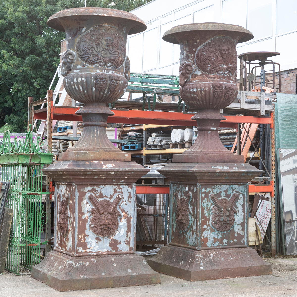 Pair of Monumental Cast Iron Urns on Plinths | The Architectural Forum