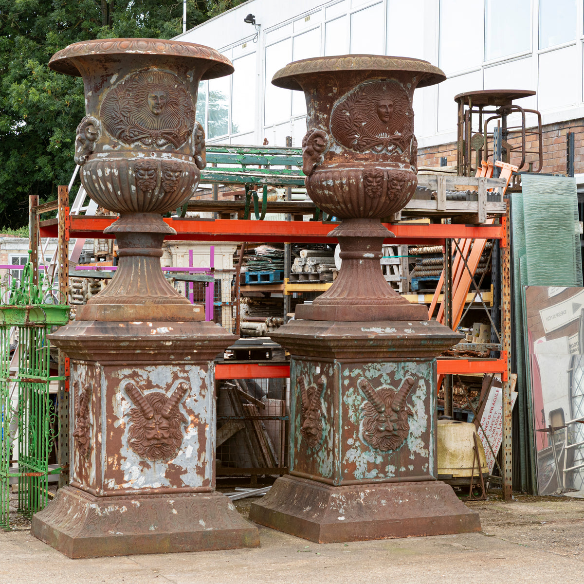 Pair of Monumental Cast Iron Urns on Plinths | The Architectural Forum