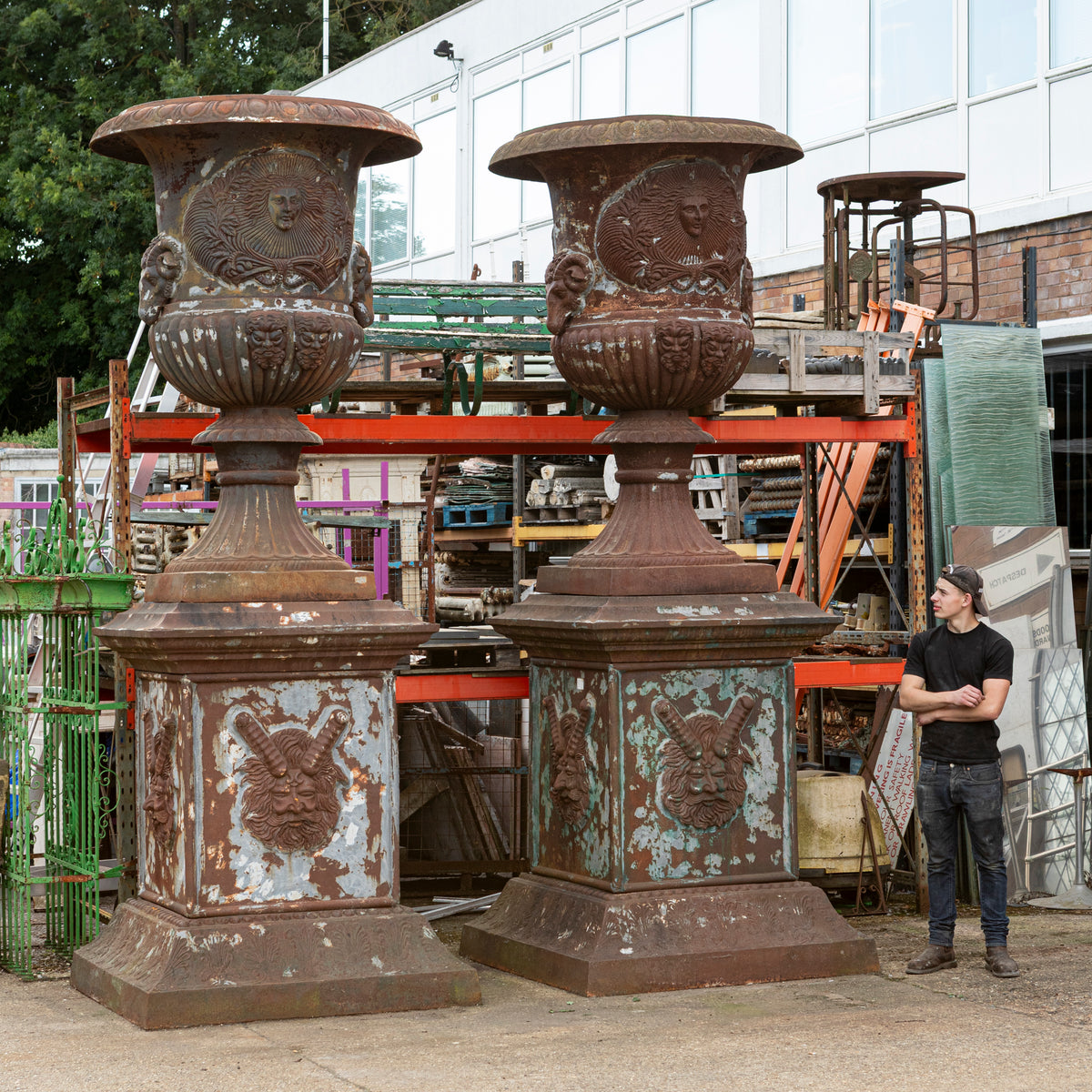 Pair of Monumental Cast Iron Urns on Plinths | The Architectural Forum