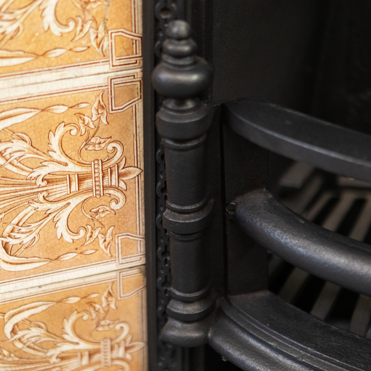 Antique Fireplace Insert with Tiled Arched Opening | Steele & Wood Tiles | The Architectural Forum