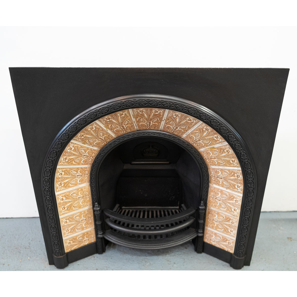 Antique Fireplace Insert with Tiled Arched Opening | Steele & Wood Tiles | The Architectural Forum