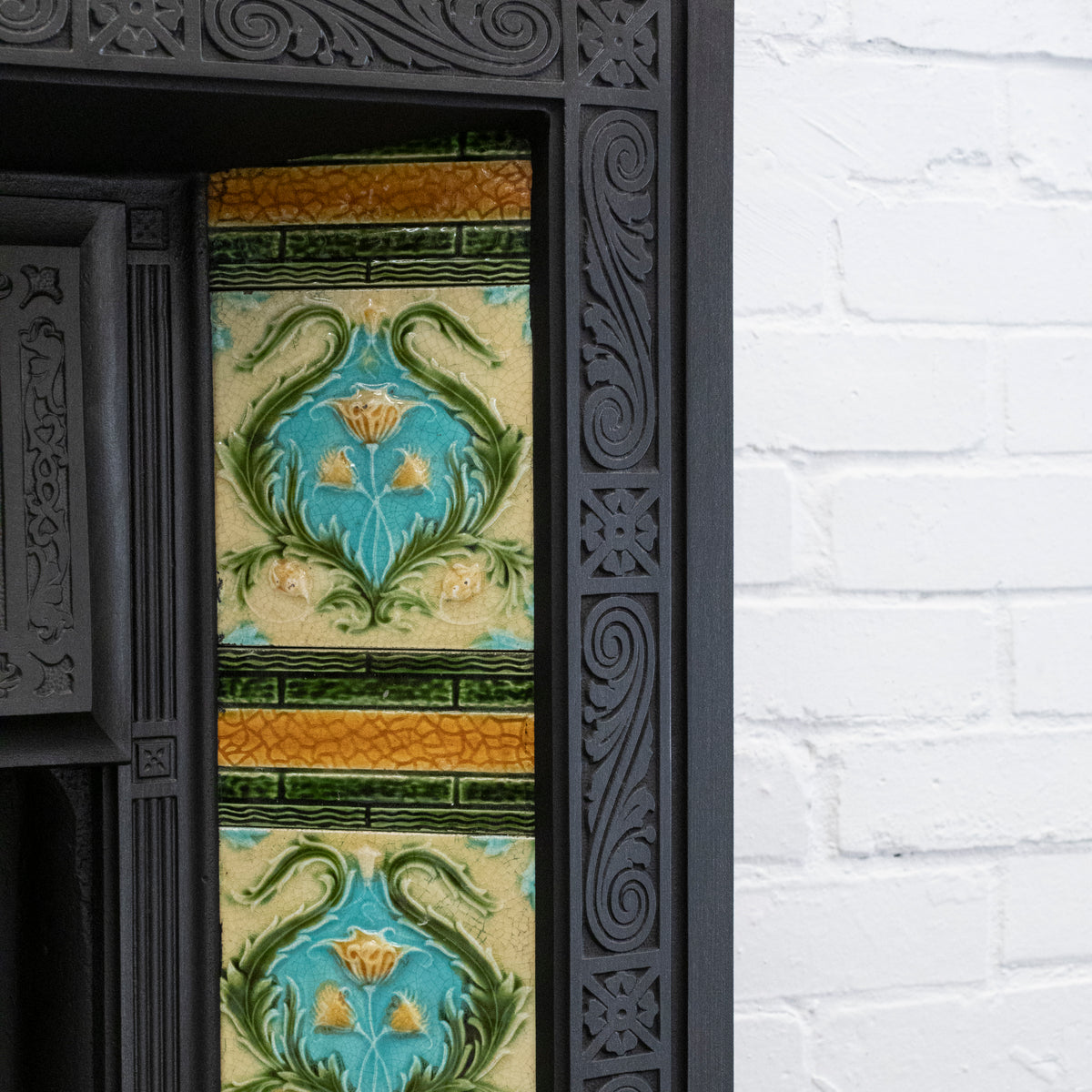 Antique Cast iron Fireplace Insert with Green &amp; Blue Tiles | The Architectural Forum