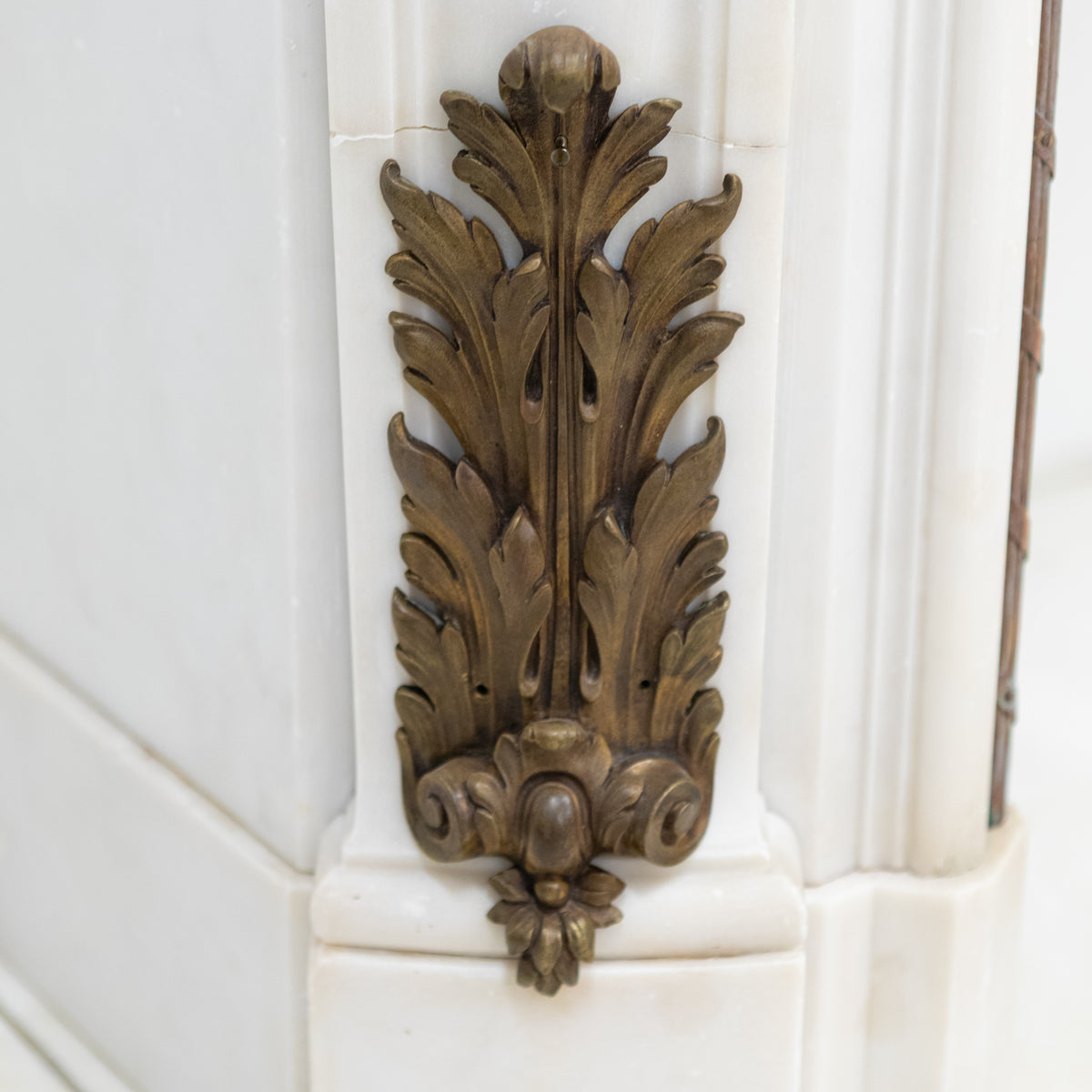Antique French Louis XV Style Statuary Marble Fireplace with Brass Mounts | The Architectural Forum