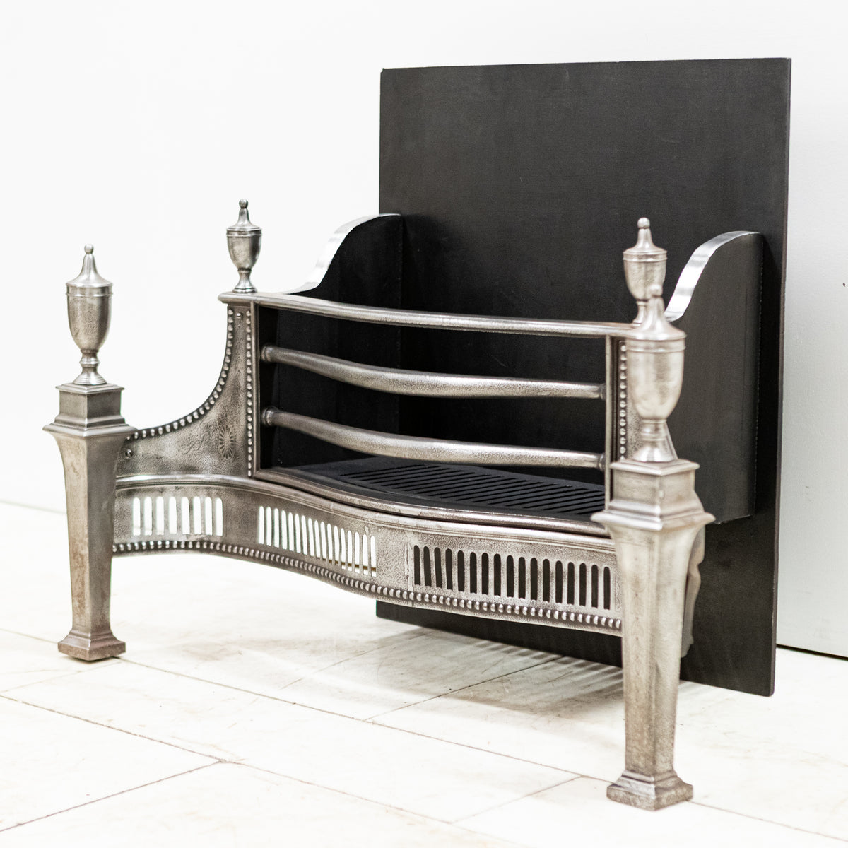 Large Antique Georgian polished Steel Fire Basket with Finials