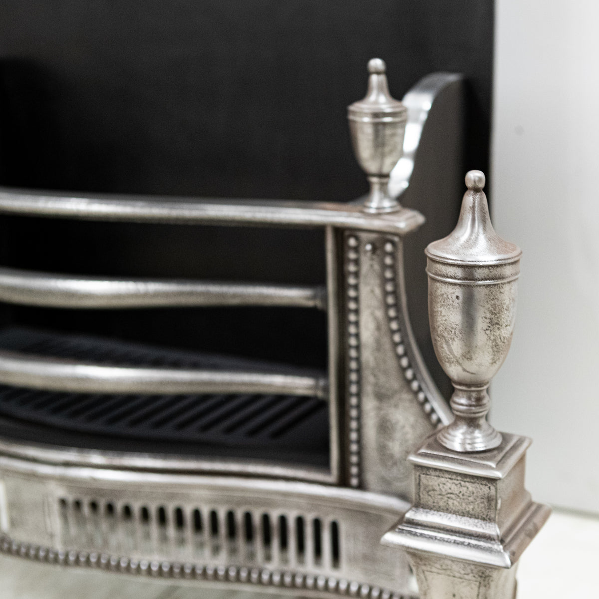 Large Antique Georgian polished Steel Fire Basket with Finials