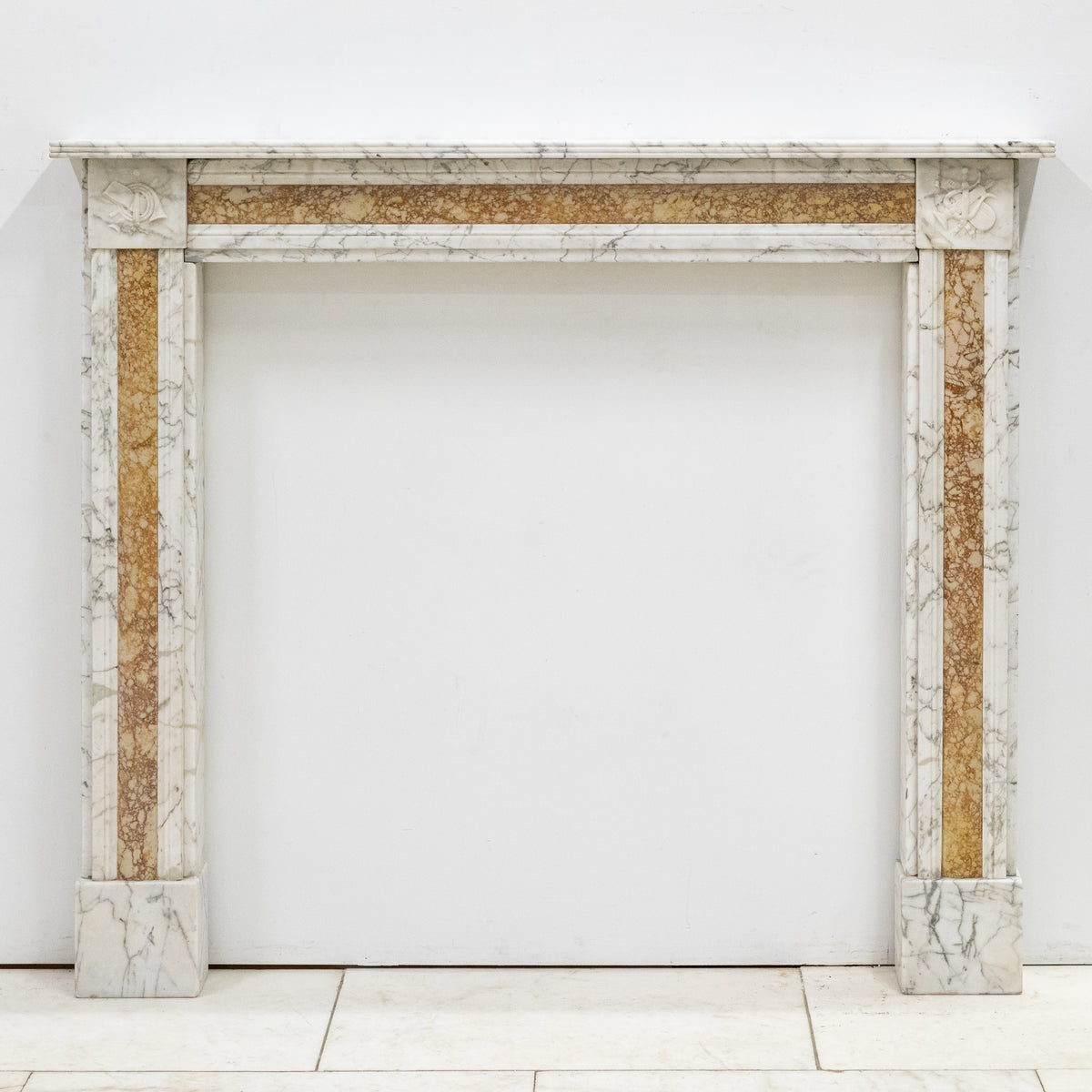 Regency Carrara Marble Fireplace Surround with Brocatelle Inlay | The Architectural Forum