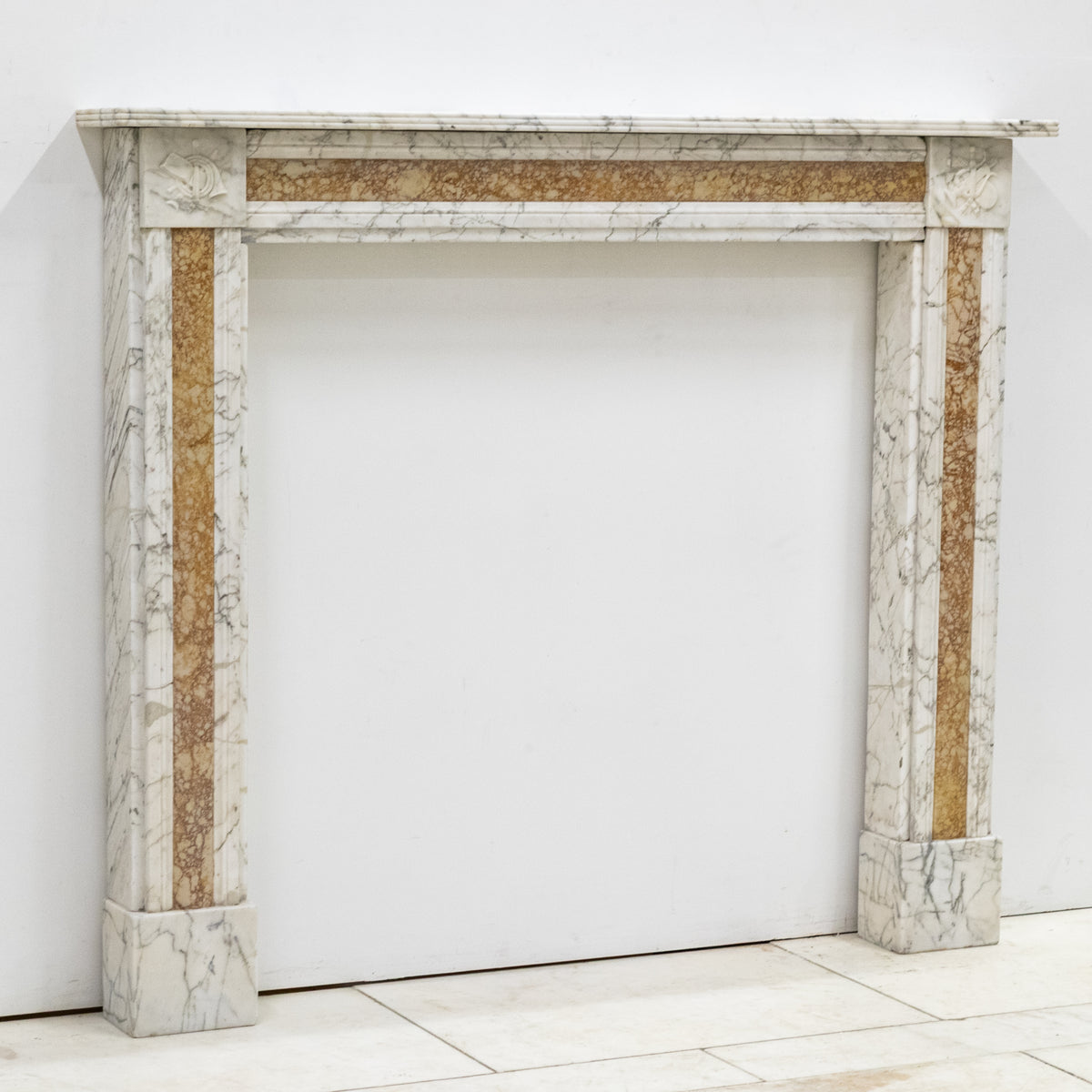 Regency Carrara Marble Fireplace Surround with Brocatelle Inlay | The Architectural Forum