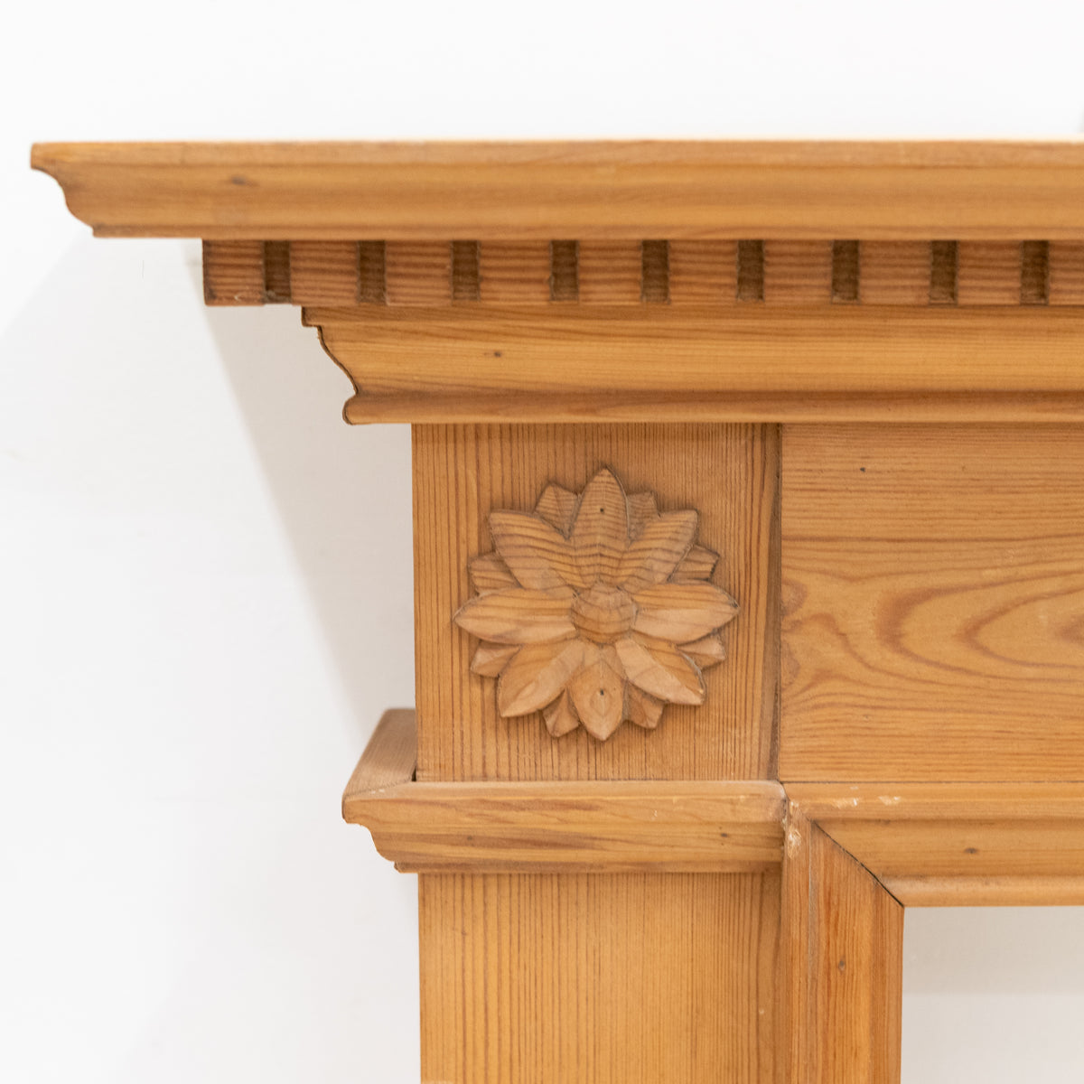 Antique Wooden Fireplace Surround with Flowers