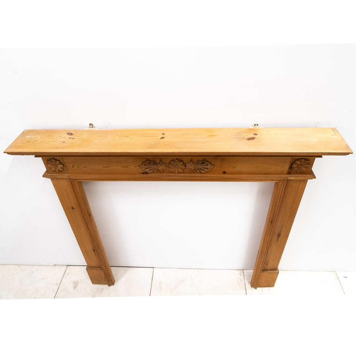 Antique Wooden Fireplace Surround with Flowers