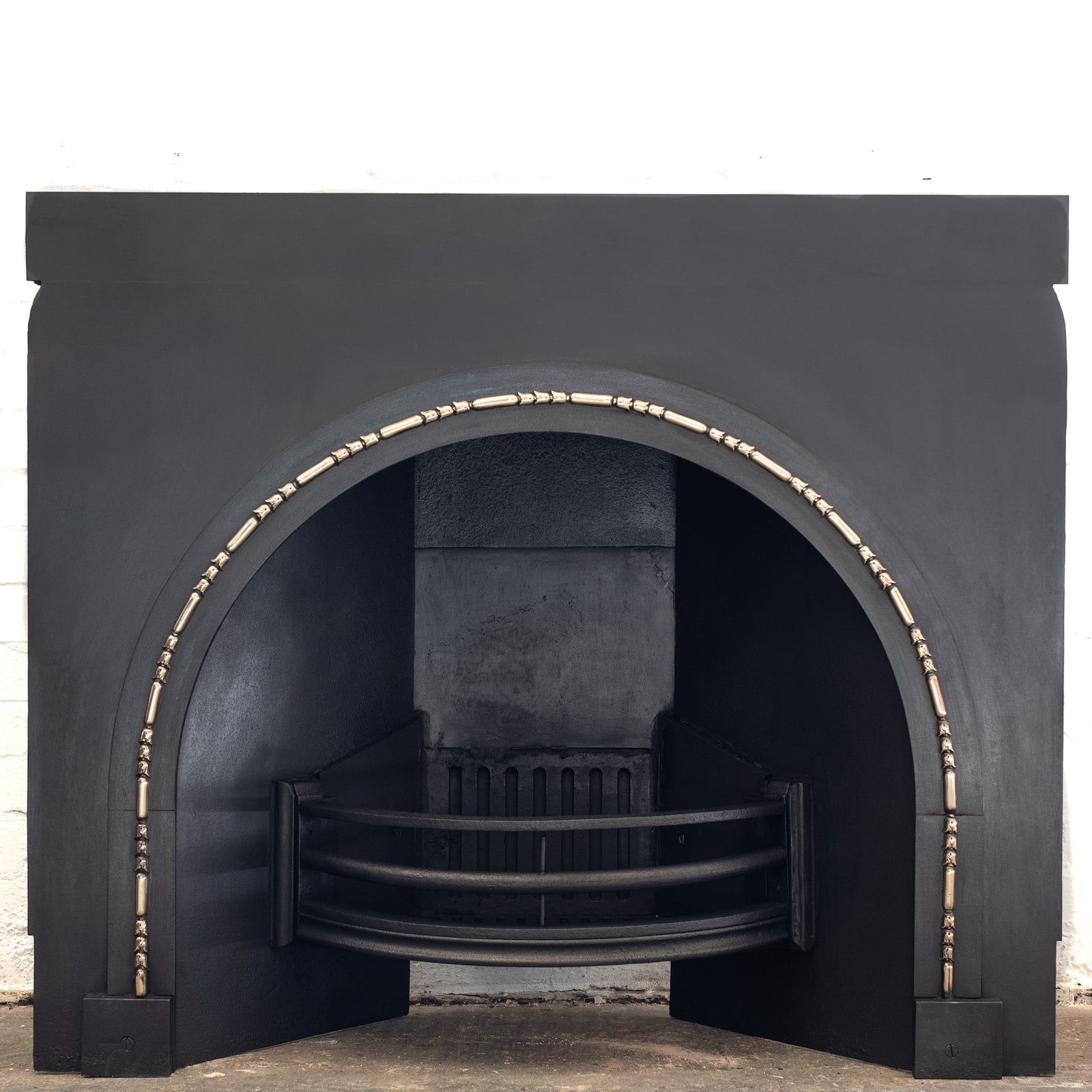 Antique Arched Cast Iron Insert with Brass | The Architectural Forum