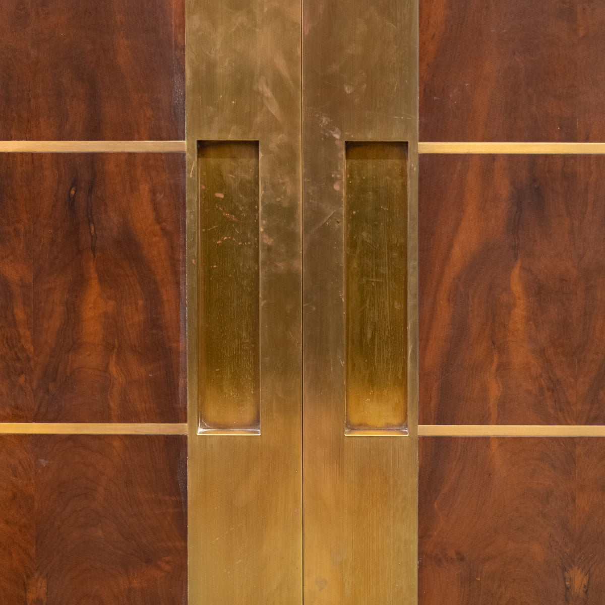 Large Bookmatched Walnut Mirrored Pocket Doors | The Architectural Forum