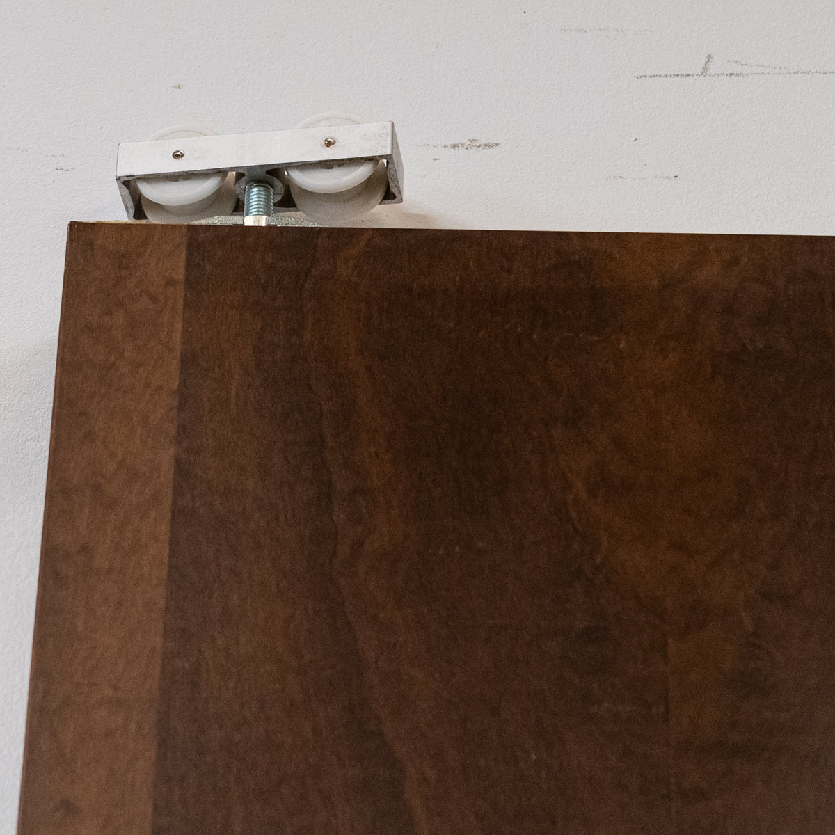 Large Bookmatched Walnut Mirrored Pocket Doors | The Architectural Forum