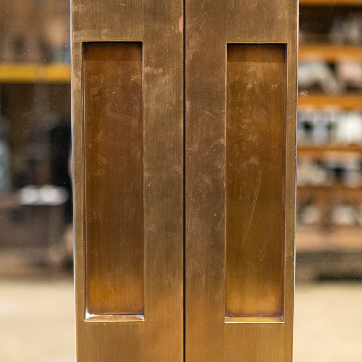 Large Bookmatched Walnut Mirrored Pocket Doors | The Architectural Forum
