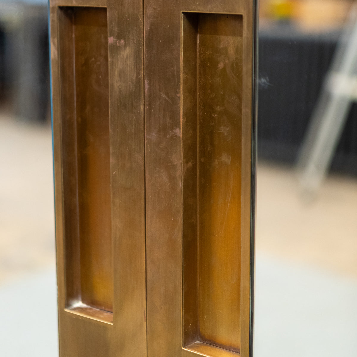 Large Bookmatched Walnut Mirrored Pocket Doors | The Architectural Forum