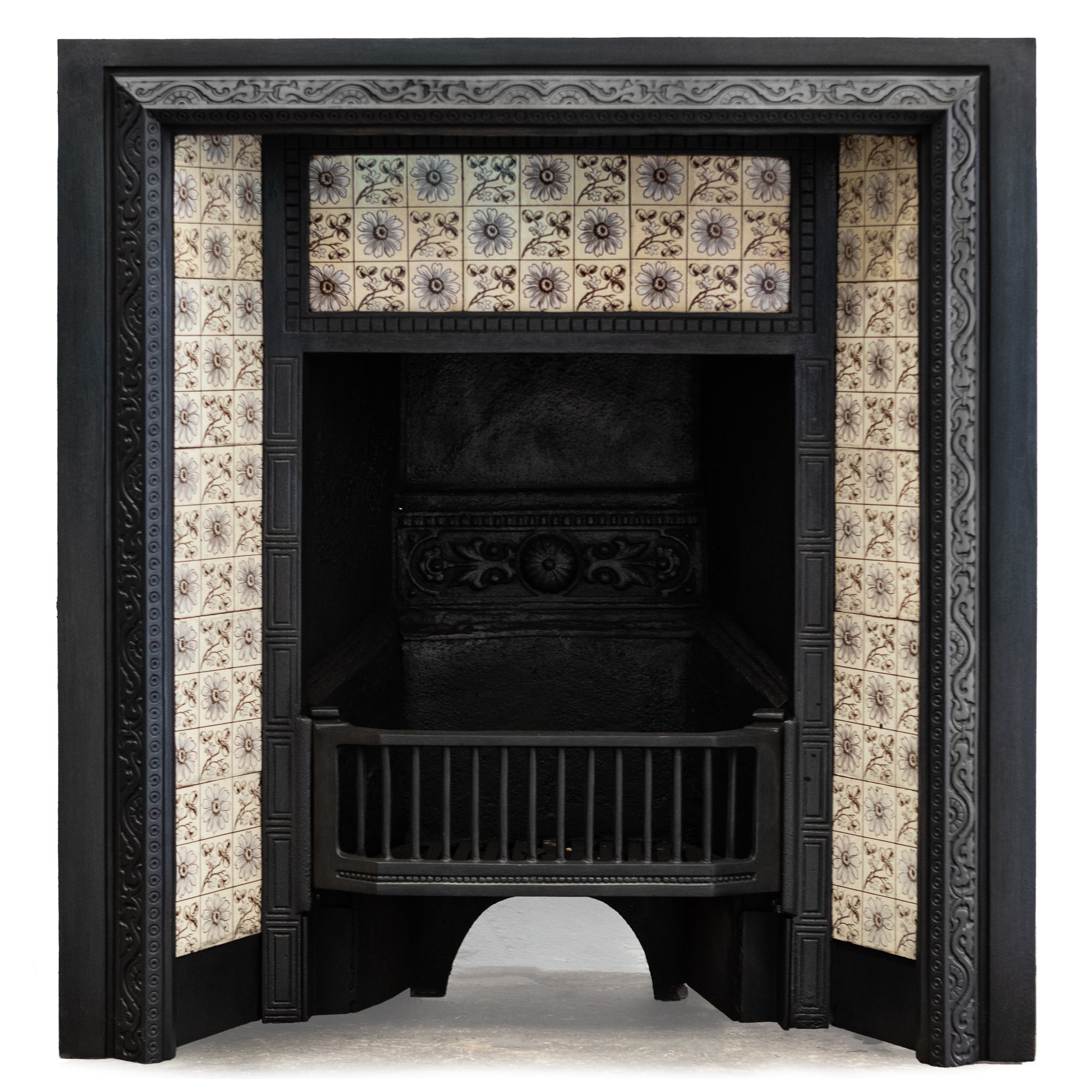 Antique Cast Iron Fireplace Insert With Pale Blue Floral Tiles | The Architectural Forum