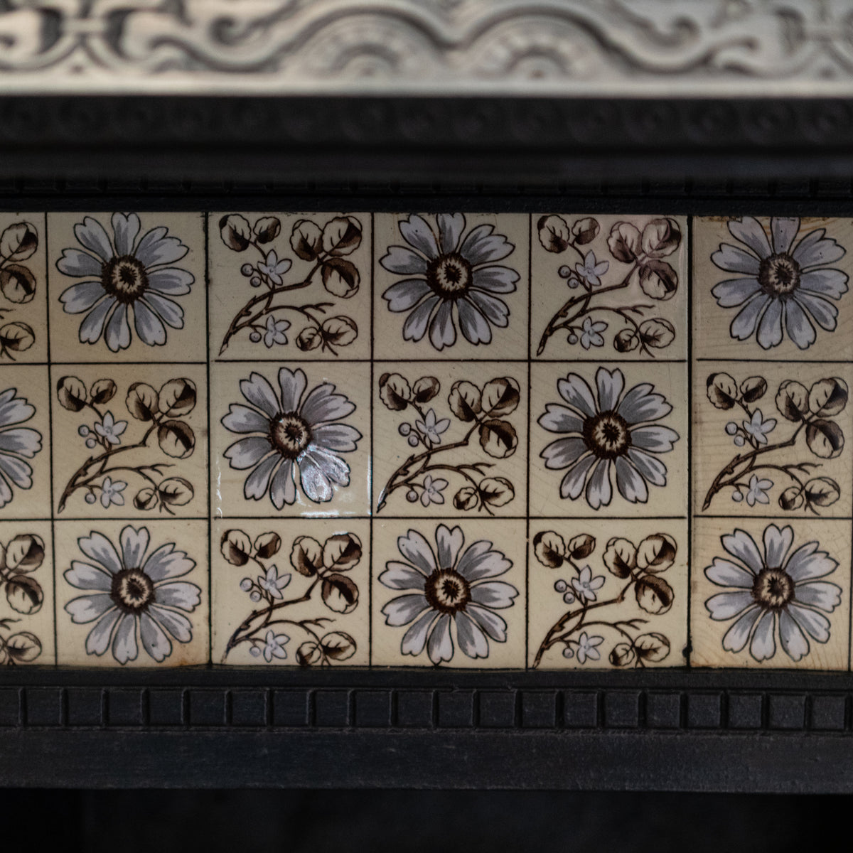 Antique Cast Iron Fireplace Insert With Pale Blue Floral Tiles | The Architectural Forum