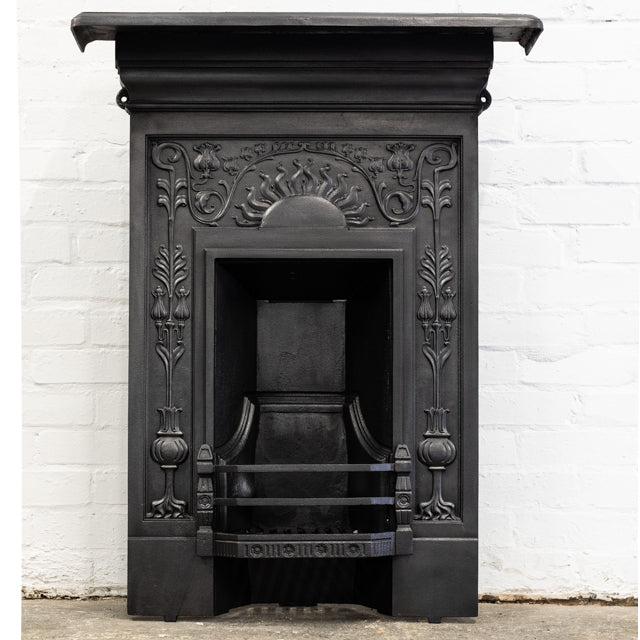 Antique Iron Combination Fireplace With Ornate Details | The Architectural Forum