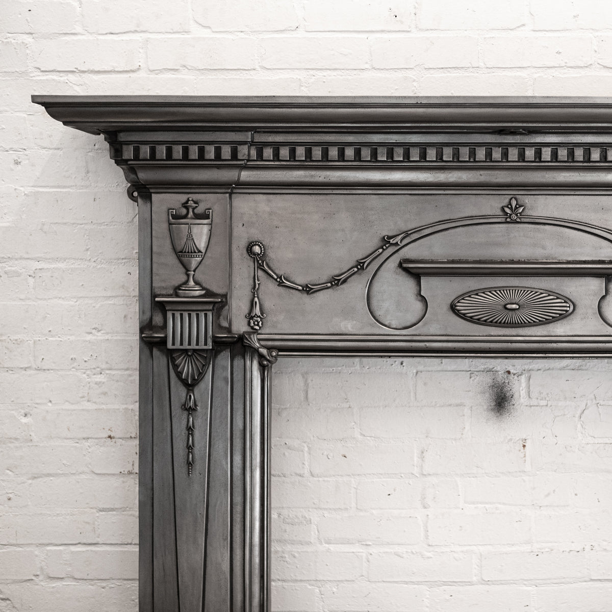 Antique Polished Cast Iron Fireplace Surround | The Architectural Forum