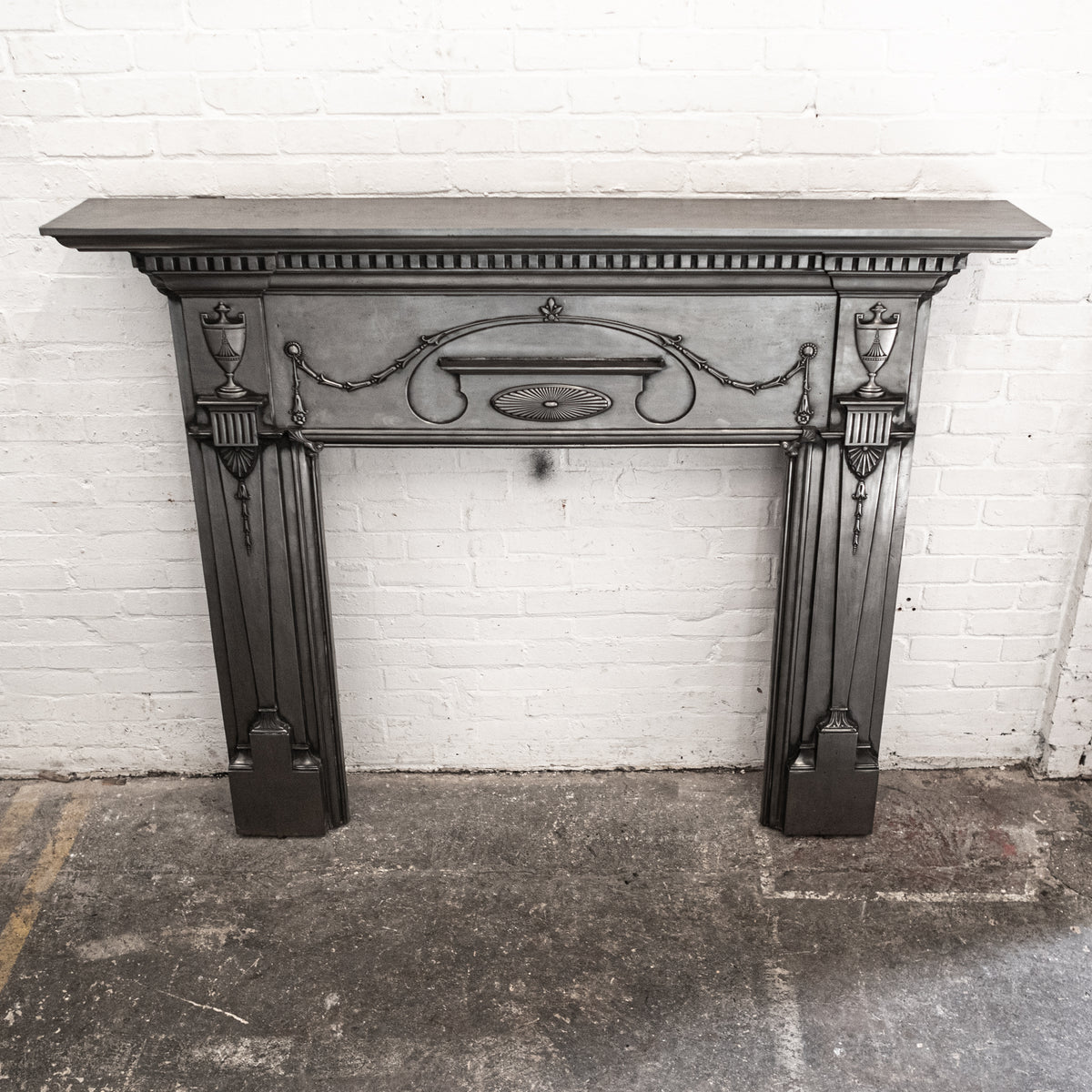 Antique Polished Cast Iron Fireplace Surround | The Architectural Forum