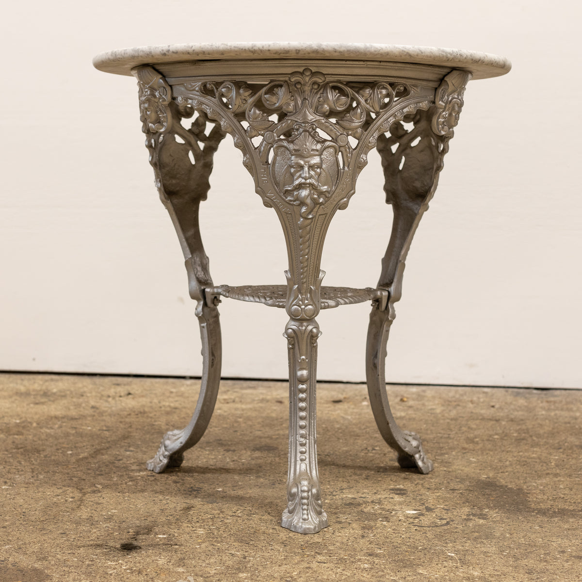 Antique Cast Iron Round Table with Marble Top | The Viking | The Architectural Forum