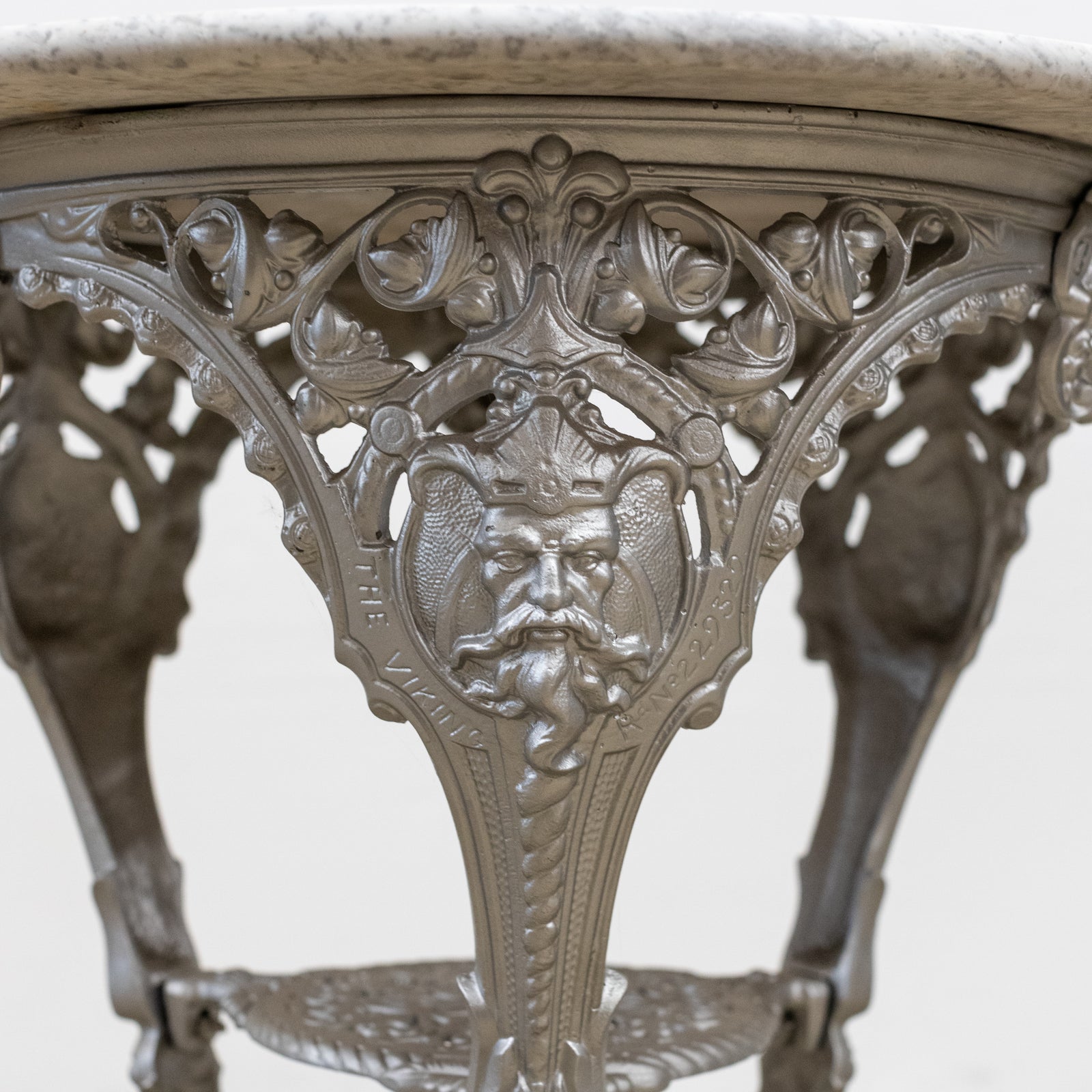 Antique Cast Iron Round Table with Marble Top | The Viking | The Architectural Forum