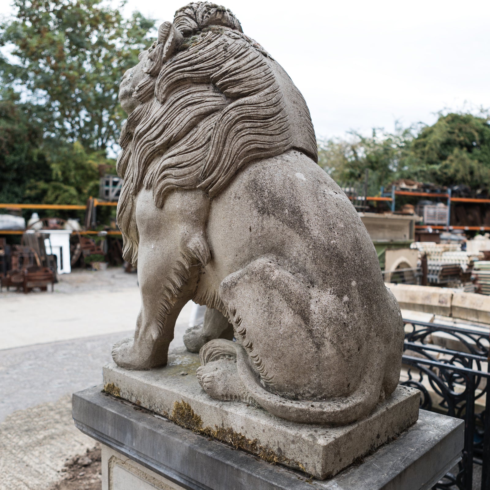 Reclaimed Pair of Monumental Stone Lions on their own Plinth | The Architectural Forum