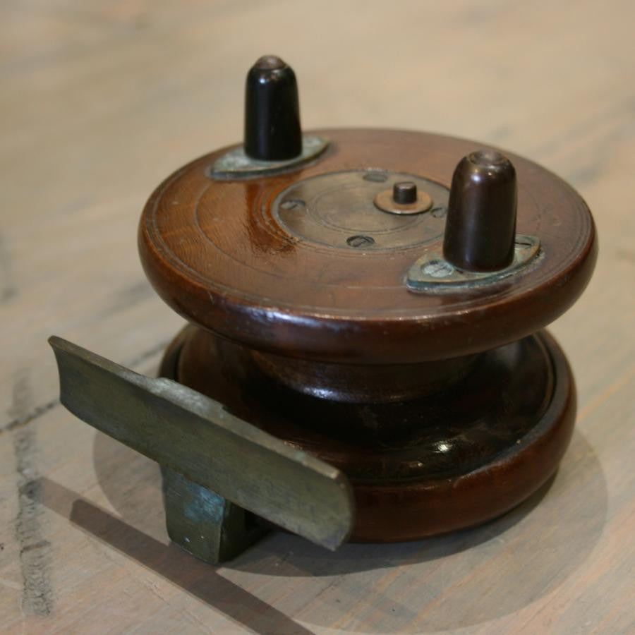 Vintage mahogany fishing reel | The Architectural Forum
