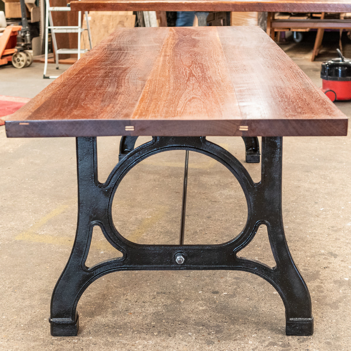 Teak Plank TopTable With Industrial Cast Iron Legs | The Architectural Forum